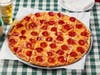 Their tavern-style pizza is a customer favorite! 