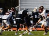 Anders Gerosa (25) and Andrew Fitzpatrick (5) fighting for a ground ball against Staples