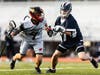 Preston Penn dodging past a Staples defender