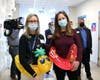 Medfield High School nurses Liz Bennett and Brittany Hardiman conducting "pool testing" 
