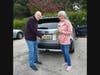 Rick and Stephanie Lux of East Providence put on their new Pomham Rocks Lighthouse license plates.