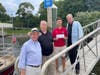 Alex Dias, President of Friends of Pomham Rocks Lighthouse, accepts grant check from, left to right, Squantum Association Charitable Foundation President, James Sweeney; Marketing Chair, Paul Williams; and member, Brian Sadler.   