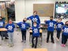 Students and staff members at Tawanka Elementary School in Bucks County, Pennsylvania during a check presentation to Moe Siddiqu, Executive Director from We Make, Autism At Work.