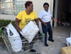 Shandra Stringer delivering food in her community of Riviera Beach, Florida.