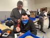 Tony Lesenskyj and his son Colin at the We Make, Autism At Work facility in New Jersey.