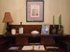 The side entrance hall at the Hammerstein's former home where guests of the bed and breakfast sign in. Framed photos of Oscar Hammerstein are sprinkled throughout the rooms along with pineapples which were a symbol of hospitality for the Hammersteins.