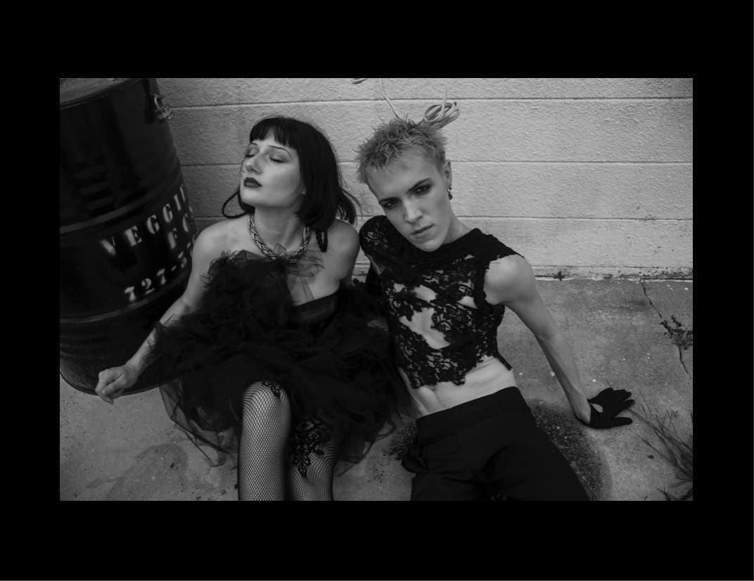 Connor Totten, Designer, and Simona Tamulevicius, Model, pose for a promo photo for a fashion show to take place an August 5, 2023 at Sundial in St. Pete.