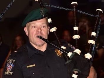 Lieutenant Daniel Friz is being remembered as someone who was always ready to lend a hand. He played in the Montgomery County Police Department's bagpipe band, as pictured above. He leaves behind a wife and three children.