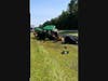 Two individuals were injured after a vehicle struck a DOT tractor in the median of Route 18 North, police said. 