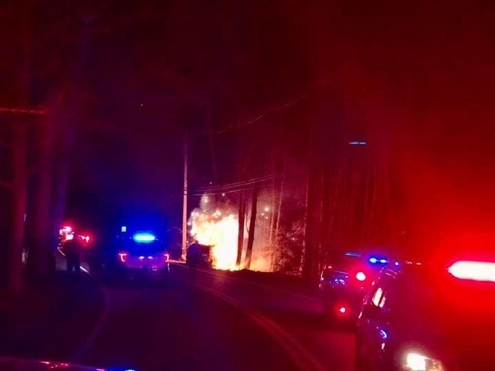 A Howell police officer pulled the driver of a burning vehicle to safety on Saturday, according to the department.