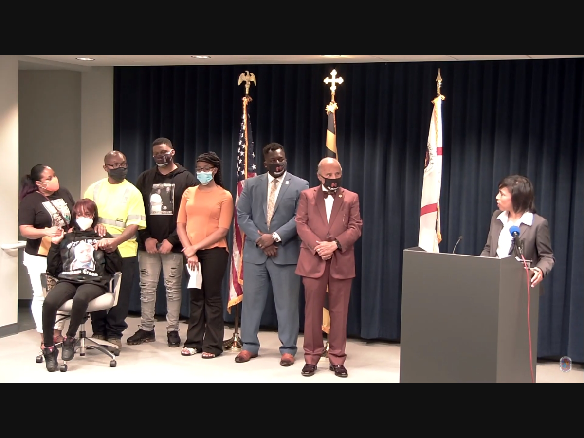 Prince George's County will pay $20 million to the family of William Green, County Executive Angela Alsobrooks announced on Monday. Green's family (first five from left) and their lawyers (second and third from right) joined Alsobrooks (far right).