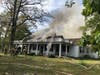 A vacant home caught fire in Quiet Waters Retreat on Friday afternoon, the Anne Arundel County Fire Department says.
