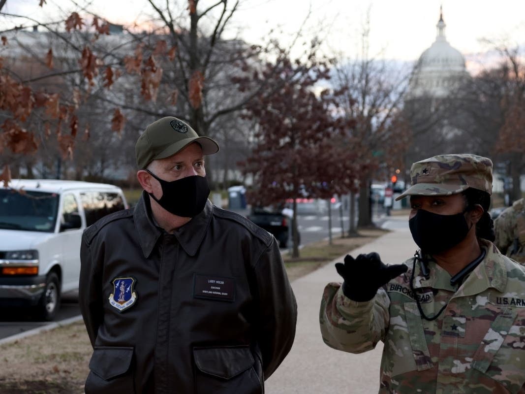 Brigadier General Janeen L. Birckhead briefs Gov. Larry Hogan on the Maryland National Guard's efforts ahead of President-elect Joe Biden's inauguration.