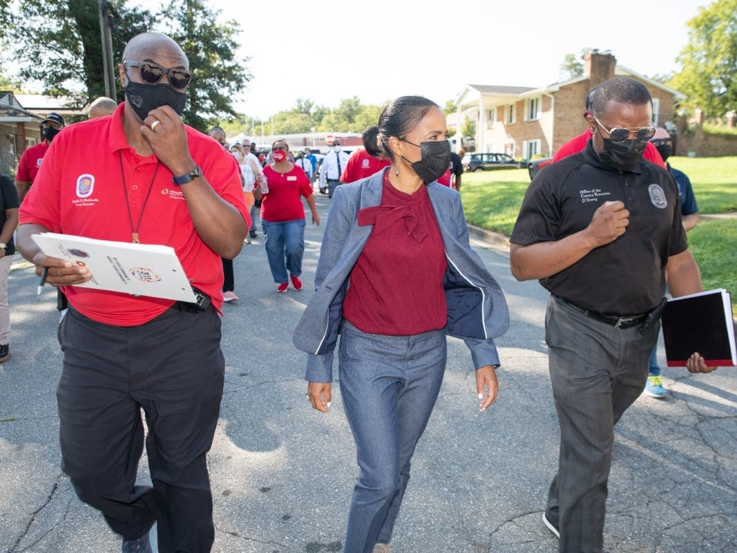 Prince George's County Executive Angela Alsobrooks (middle) wants to work with Prince George's County Police Department Chief Malik Aziz to reduce violent crime.
