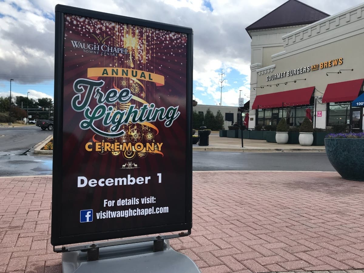 Anne Arundel County residents can attend Christmas tree lightings at Annapolis City Dock, the Glen Burnie Town Center or the Waugh Chapel Towne Centre, which is pictured above.
