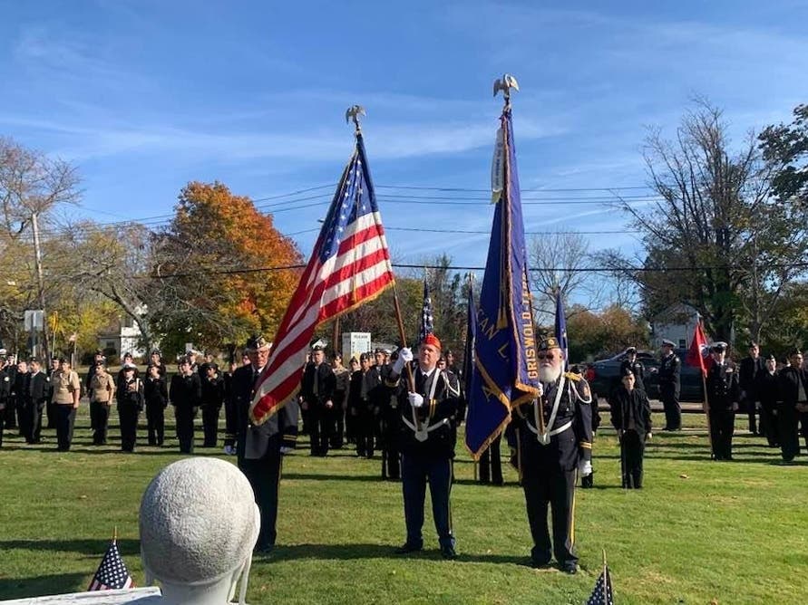 Anne Arundel County will celebrate Memorial Day with a parade, a carnival and live music. A stock photo of an American flag at a Veteran's Day parade is shown above.