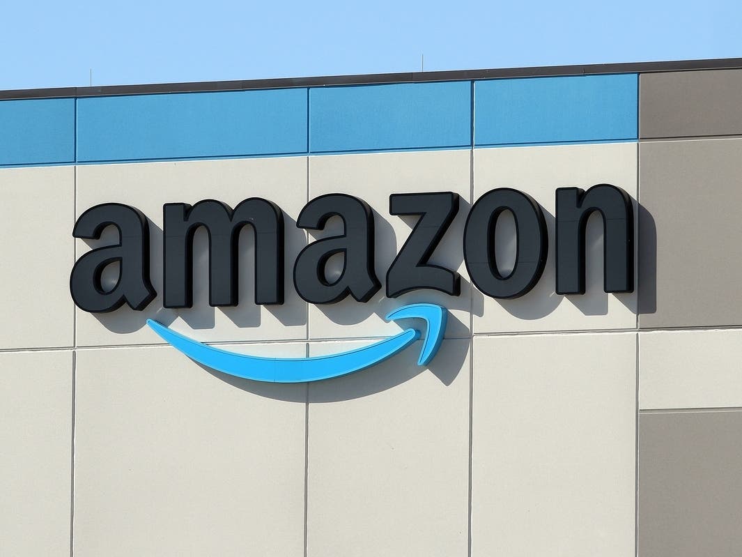 Two businesses, Bed Bath & Beyond and Amazon, announced that they will each close multiple facilities. Bed Bath & Beyond has not yet said if it will close any Maryland stores. Amazon is closing two warehouses in Maryland. An Amazon sign is pictured above.