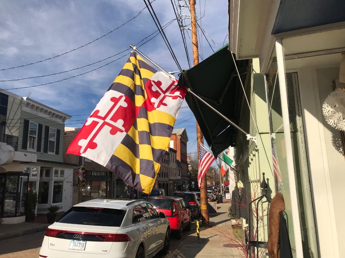 The Bureau of Labor Statistics on Tuesday announced that inflation slowed from October to November. Inflation is still getting worse in some parts of Maryland. A Maryland flag is pictured above in downtown Annapolis.