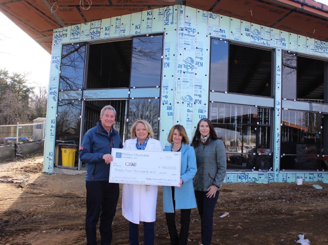 Chesapeake Region Accessible Boating announced Saturday that it earned a $94,000 grant from the Phillips Charitable Foundation. Representatives of both organizations are pictured above outside the Lawrence B. Taishoff Building at CRAB's upcoming marina.