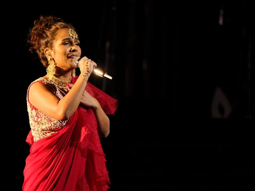 "The Voice" contestants Parijita Bastola of Severna Park and Kique Gomez of Miami performed recently in Anne Arundel County. Bastola is pictured above while singing on "The Voice." This was one of the best stories of the week.