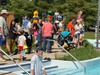 A crowd gathered to cheer their ducks across the finish line at the Cypress Cove Family Aquatic Park on August 22.