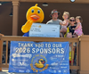 1st Place winner Louis Giovanetti posing with Puddles from Illinois American Water and his family