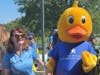 Puddles the Duck kicked off the race with a celebratory lap around Cypress Cove, meeting and greeting duck fans of all ages