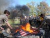 Boy Scouts from Batavia retire an American flag on November 6 during the annual VFW Vigil.