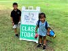 First Tee participants Aiden and Ava Jose smile because they are heading into class at the First Tee Learning Center at Ocean County Park. 