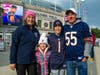 The Walsh family gathers at Soldier Field for the Real Bears Fans Wear Pink game. 