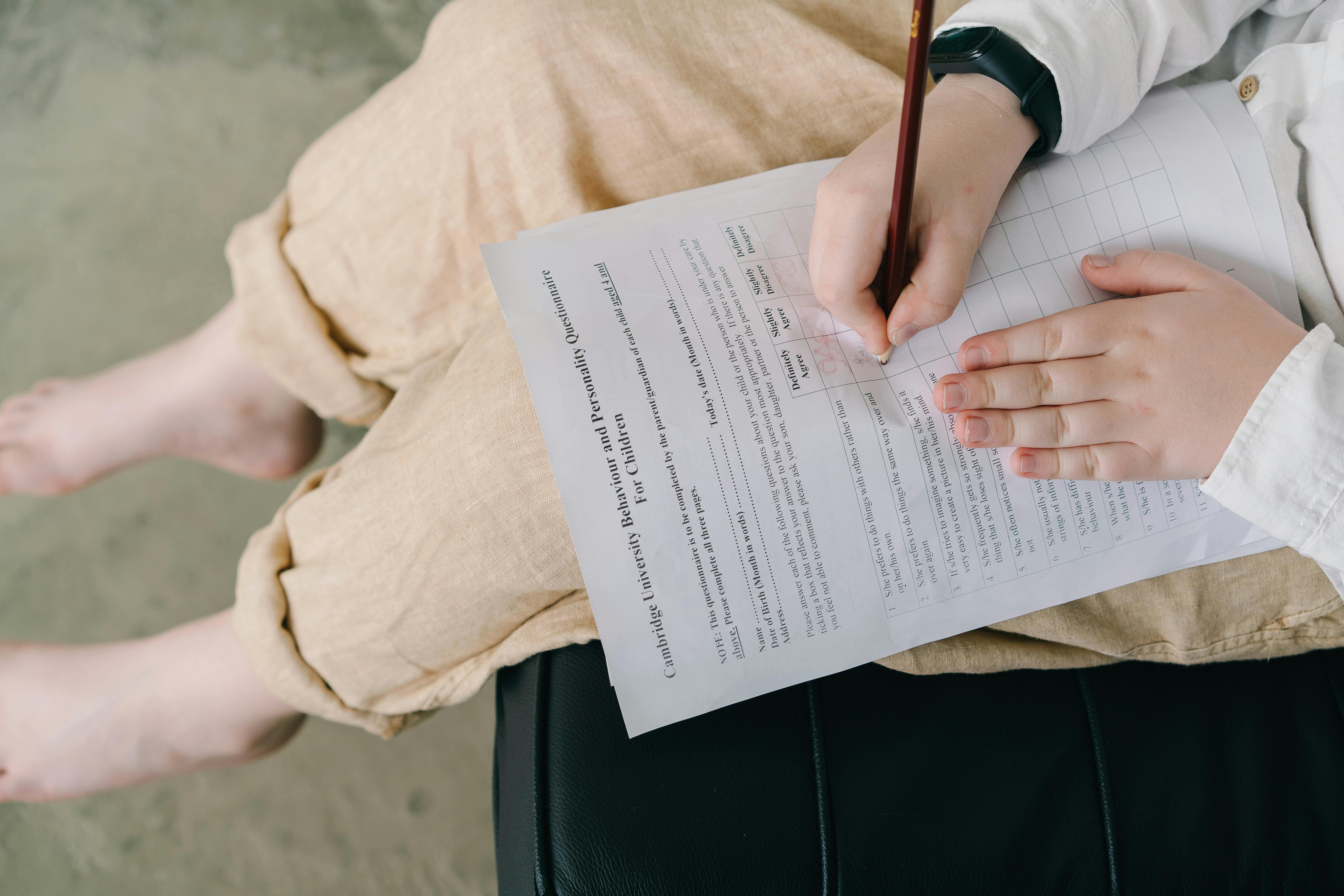 A child filling a questionnaire