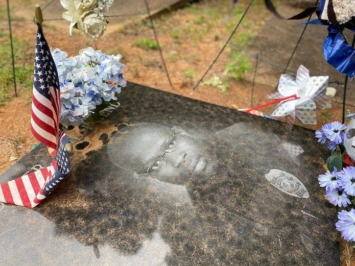 The headstone marking the grave for Tuscaloosa Police officer Dornell Cousette, who was killed in the line of duty during a shootout on Sept. 16, 2019 (Ryan Phillips, Tuscaloosa Patch)