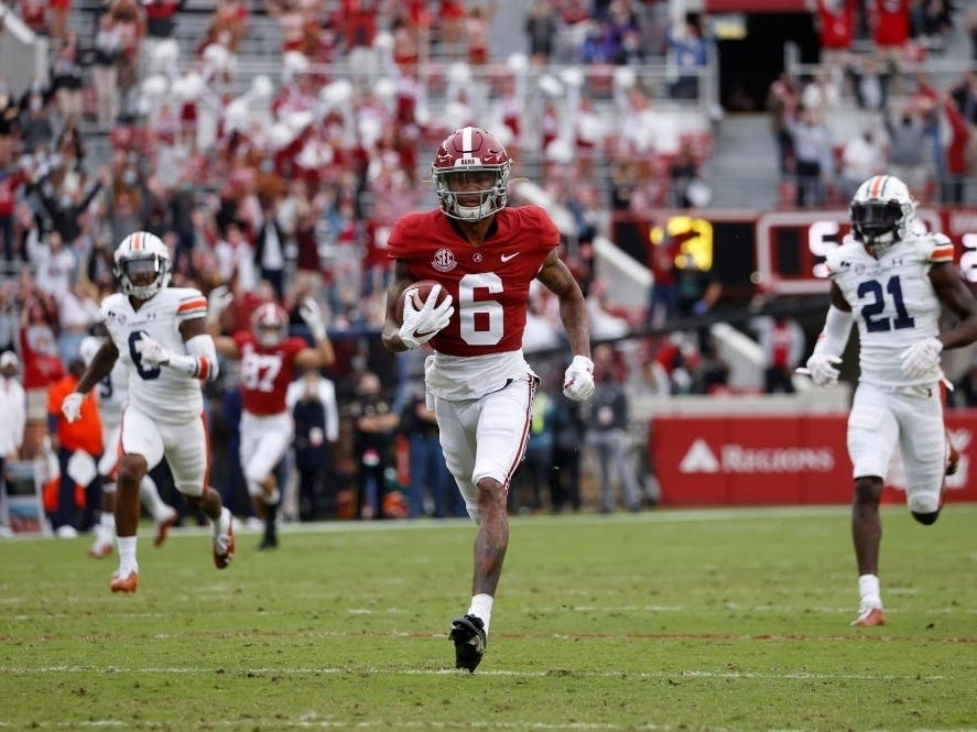 Alabama wide receiver DeVonta Smith (6) runs to the end zone for a touchdown during Saturday's game