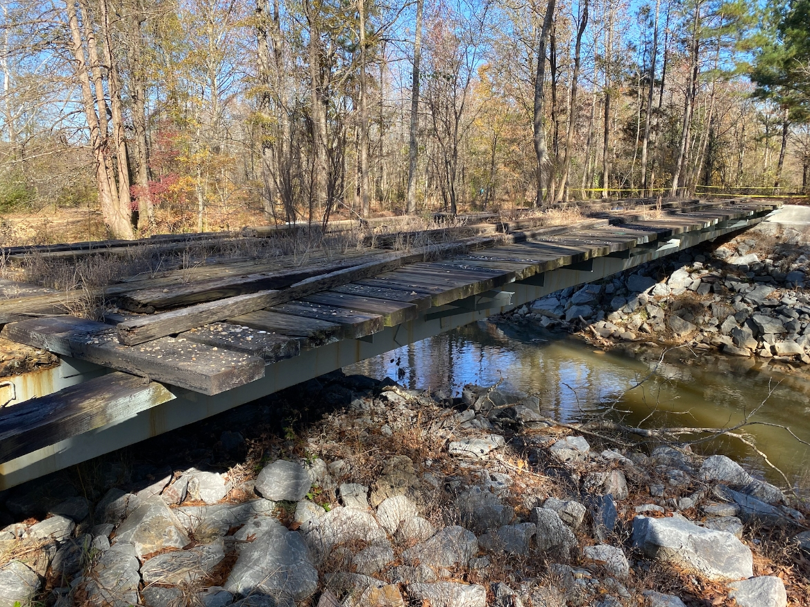 The former railroad car bridge will add accessibility to the largest park of the park, which includes rustic camping areas.