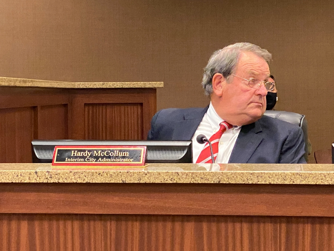 Interim Northport City Administrator Hardy McCollum listens to updates given on Northport First funds Monday night