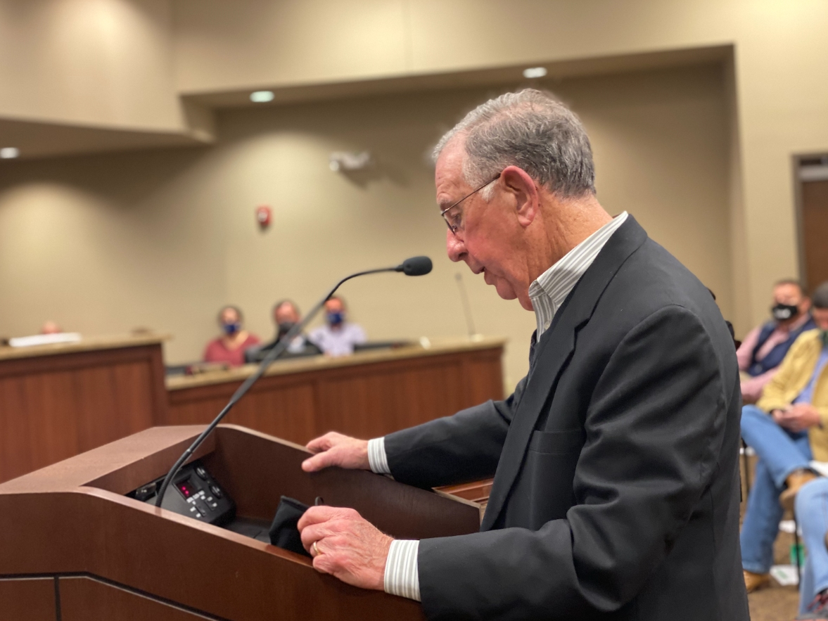 District 3 Councilman John Hinton speaks in opposition of the proposed townhome development on Hunter Creek Road Tuesday night.
