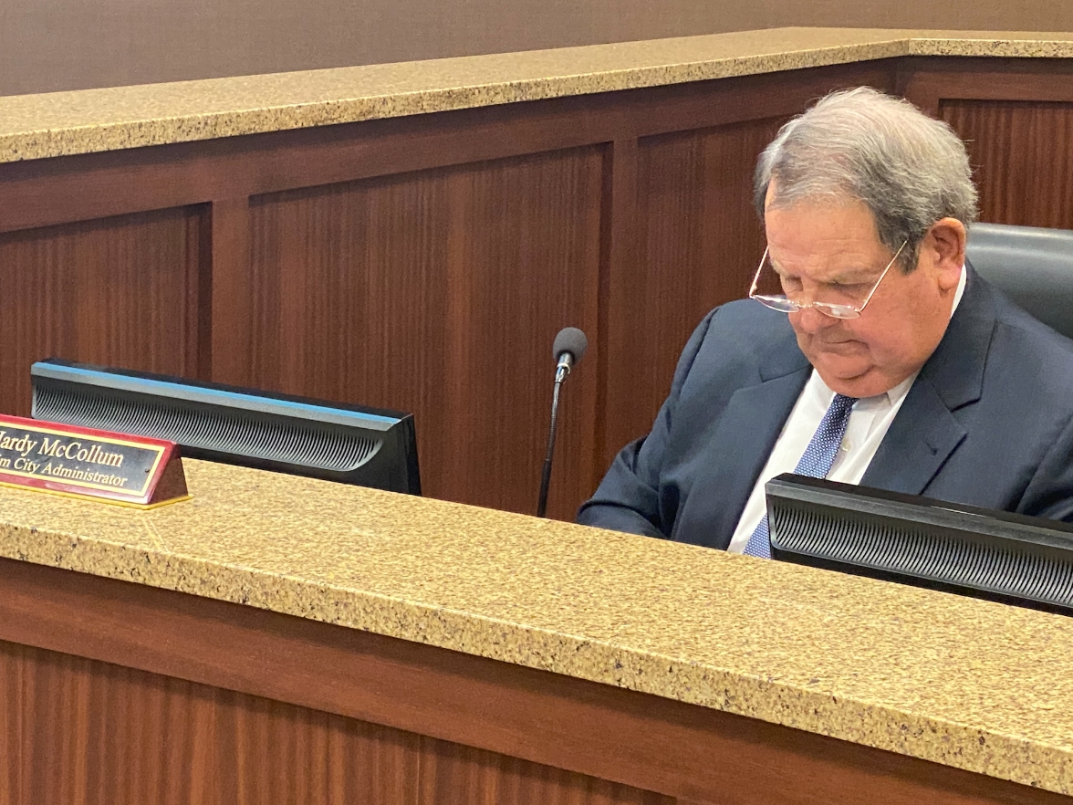 Interim City Administrator Hardy McCollum looks over notes during Monday's regular meeting of the Northport City Council. He has served in the role in an interim capacity since 2019.