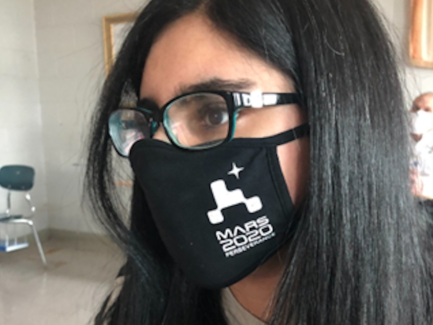 TCHS senior Vaneeza Rupani watches as NASA lands its most advanced rover on Mars after naming an accompanying helicopter that will be tested on the Red Planet. 