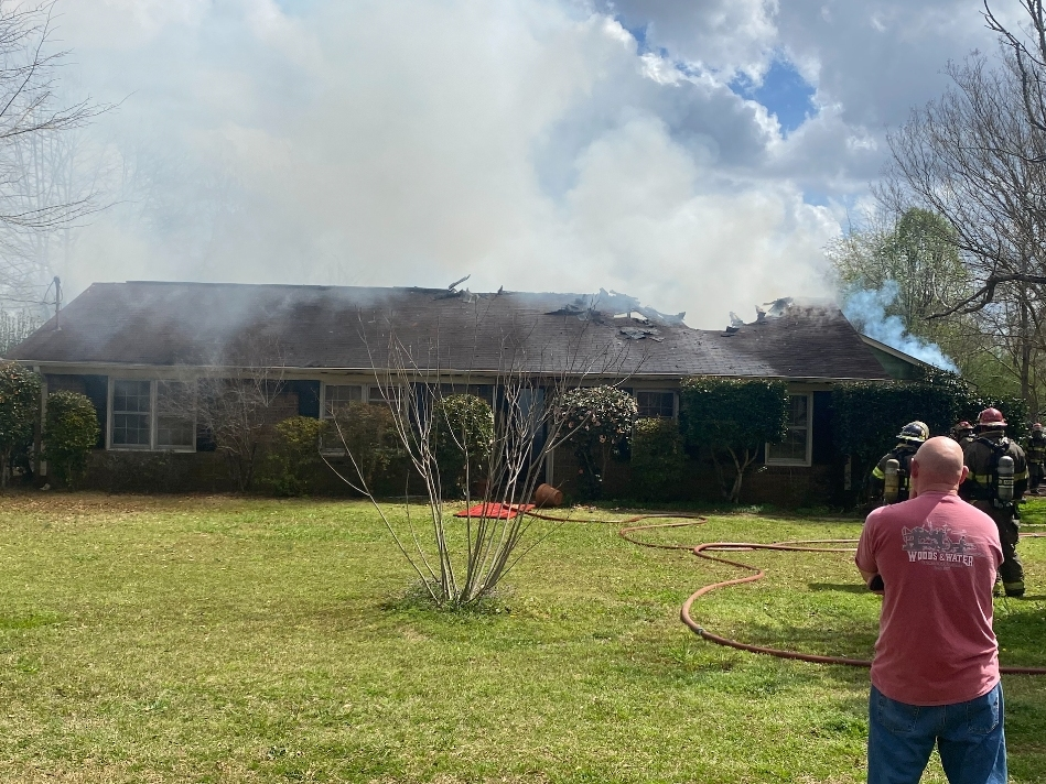 The fire was mostly contained but extensive damage could be seen as the flames subsided. 