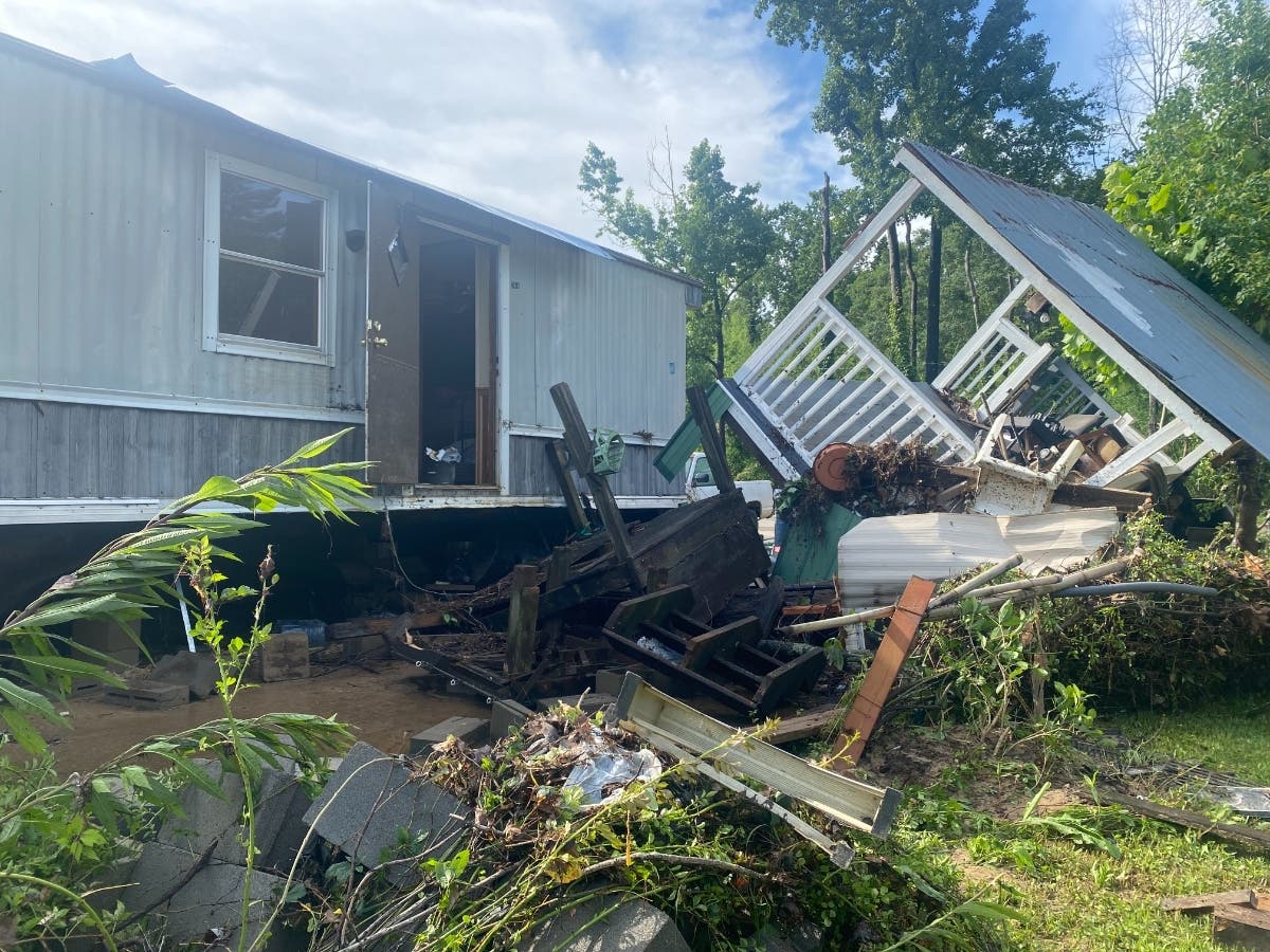 Flood waters ripped several porches from the mobile homes in Willowbrook Trailer Park overnight. 