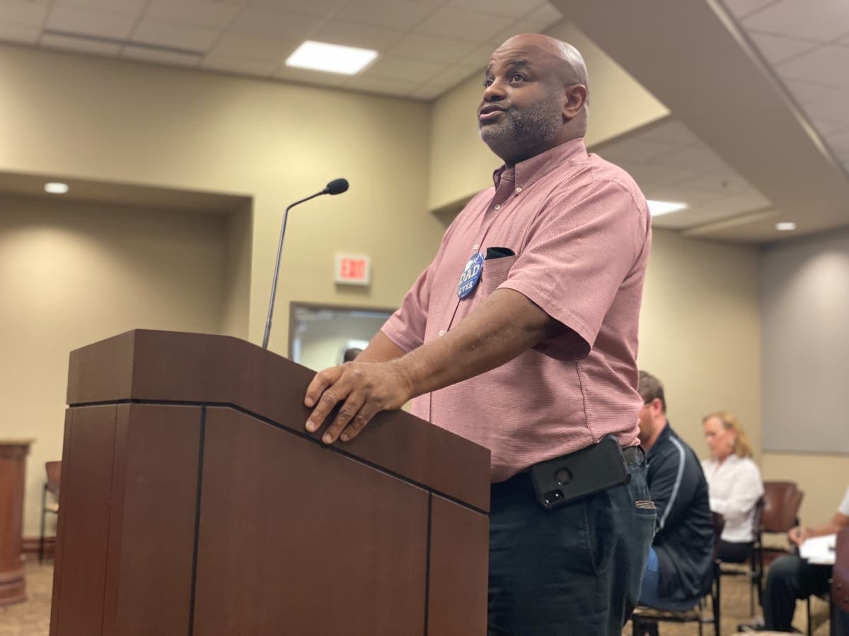 Shawn Blackburn, owner of MackHinton Homes LLC, presents his proposal for a group home on 8th Street Monday to the Northport City Council. 