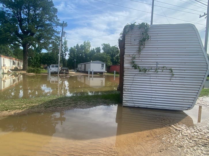 Flood water overturned and moved a storage shed at Willowbrook Trailer Park during the flooding brought on by Tropical Storm Claudette. 