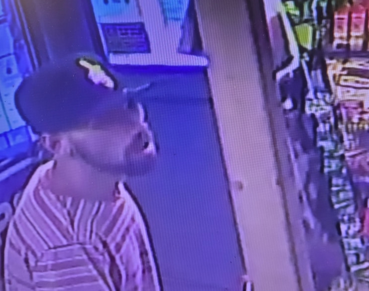 The suspect was viewed on a security camera and photos were provided to the public by police. 