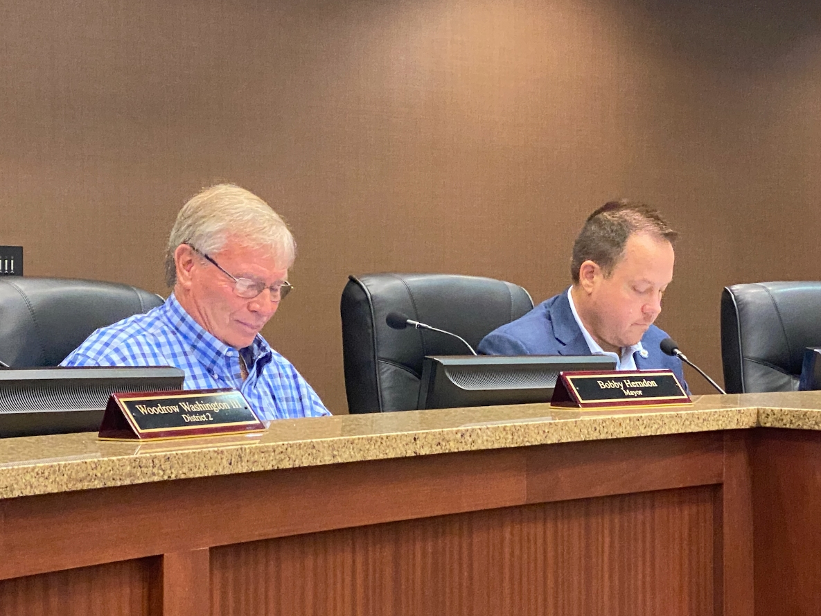 Northport Mayor Bobby Herndon (left) and City Council President Jeff Hogg during Monday night's meeting. 