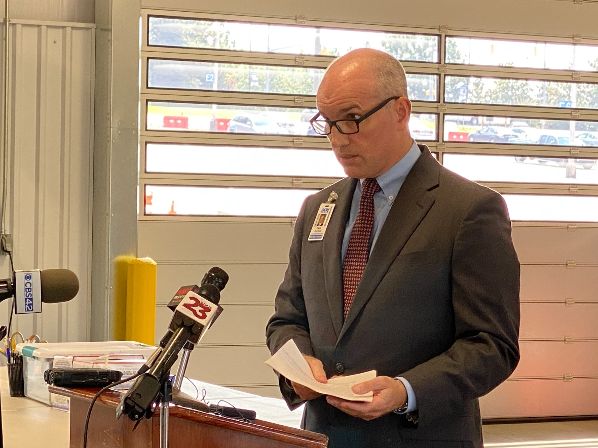DCH Chief Operating Officer Paul Betz speaks to media on Thursday at DCH's remote vaccination facility