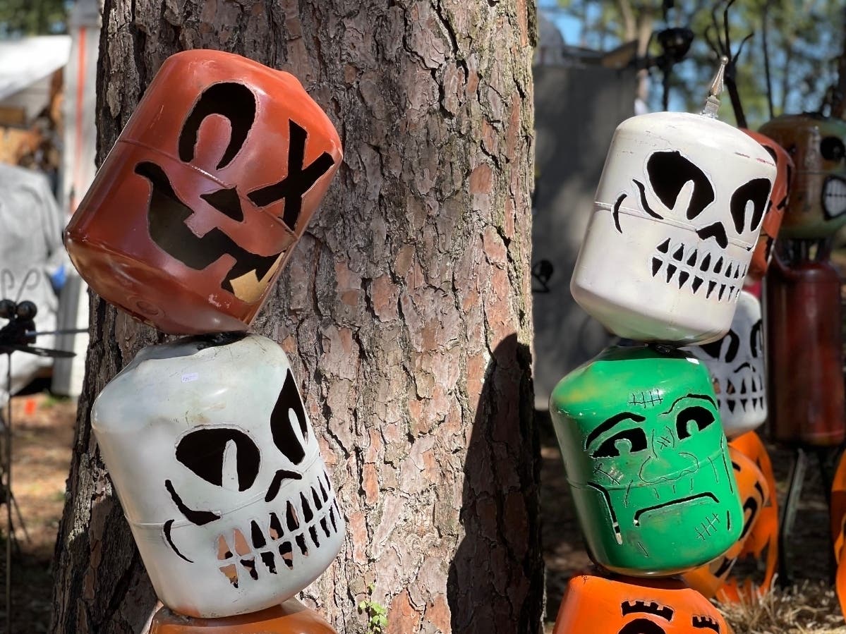 Some of the folk art for sale at Kentuck Park Saturday. 