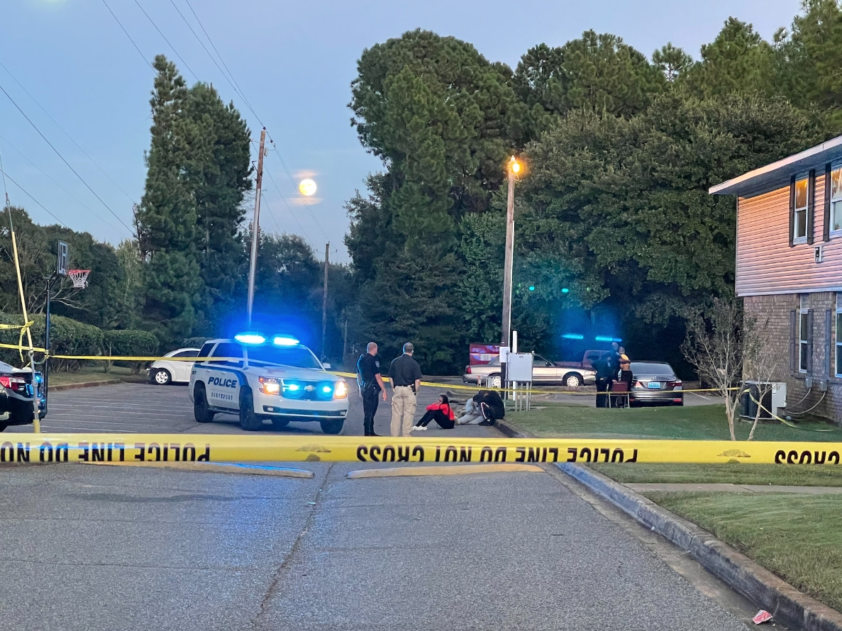 The scene at Fieldcrest Apartments following a fatal drive-by shooting at Wendy's on McFarland Boulevard. 