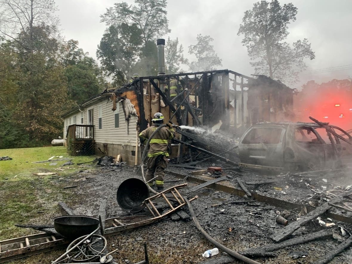 The scene of the fire on Old Buttermilk Road Thursday. 