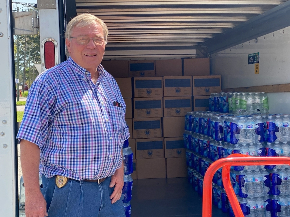 Northport Mayor Bobby Herndon takes a break while loading up donations in March 2021 to be delivered to those impacted by two destructive rounds of storms.
