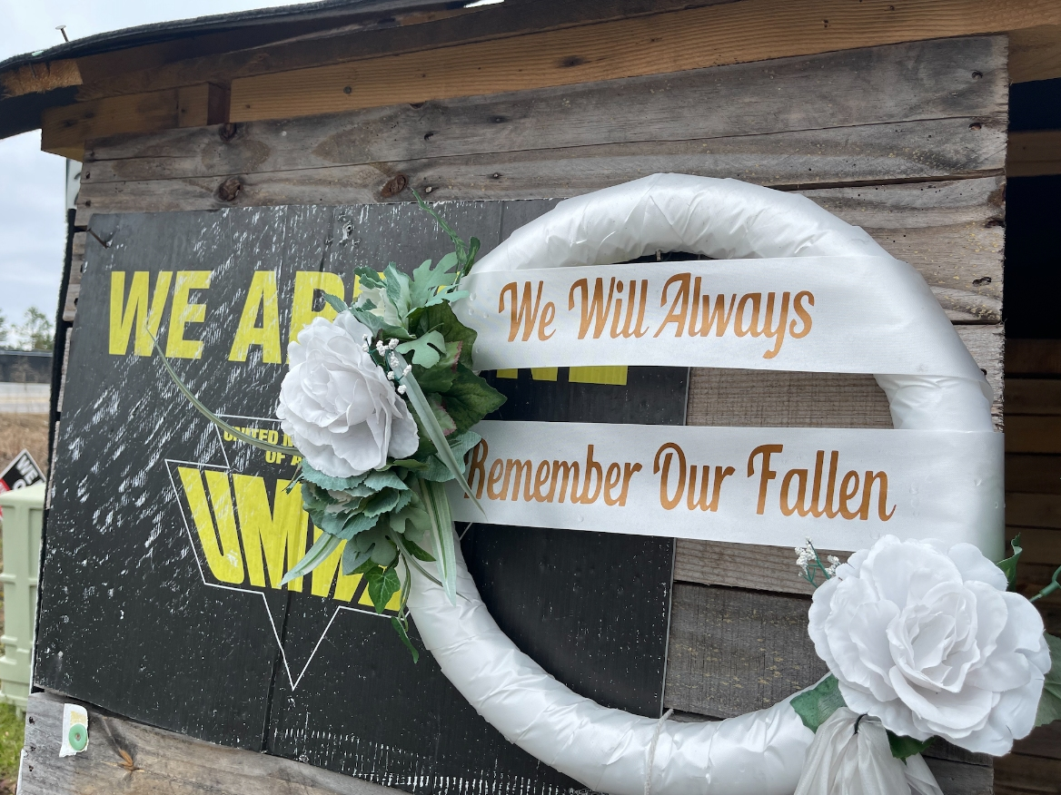 A wooden shelter at the picket line for United Mine Workers of America at Warrior Met Coal. 